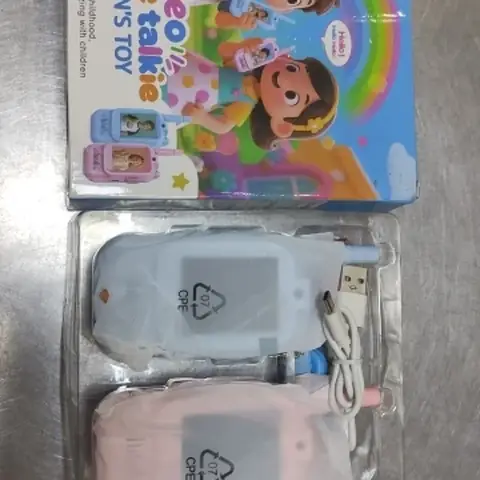 Foto de una compradora: la caja y los dos walkie-talkies recién llegados